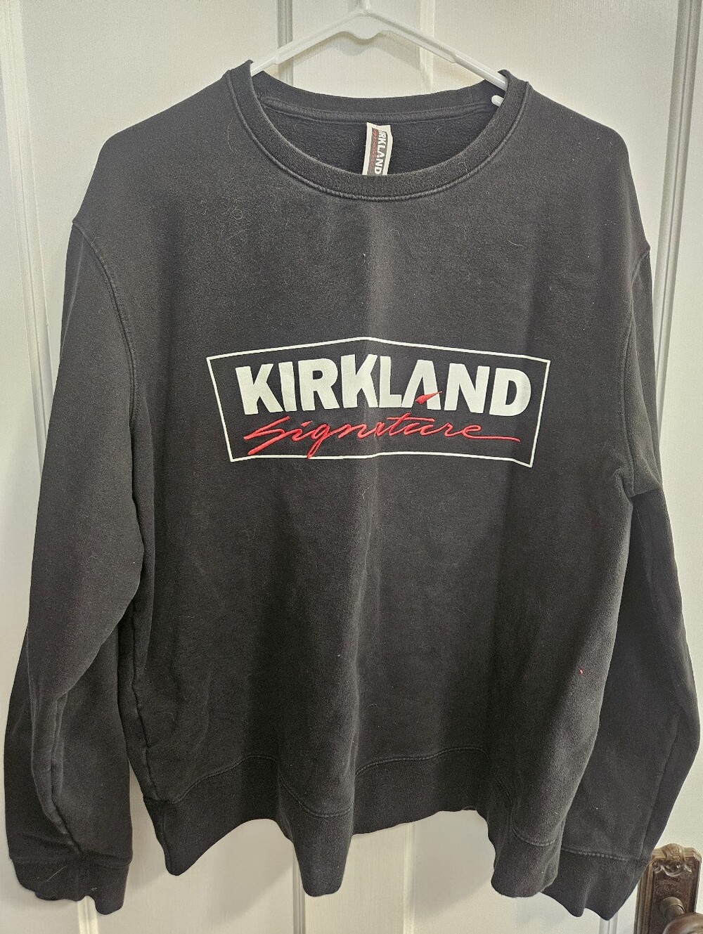 Costco Kirkland Signature Black Crewneck Sweatshirt with White & Red Logo